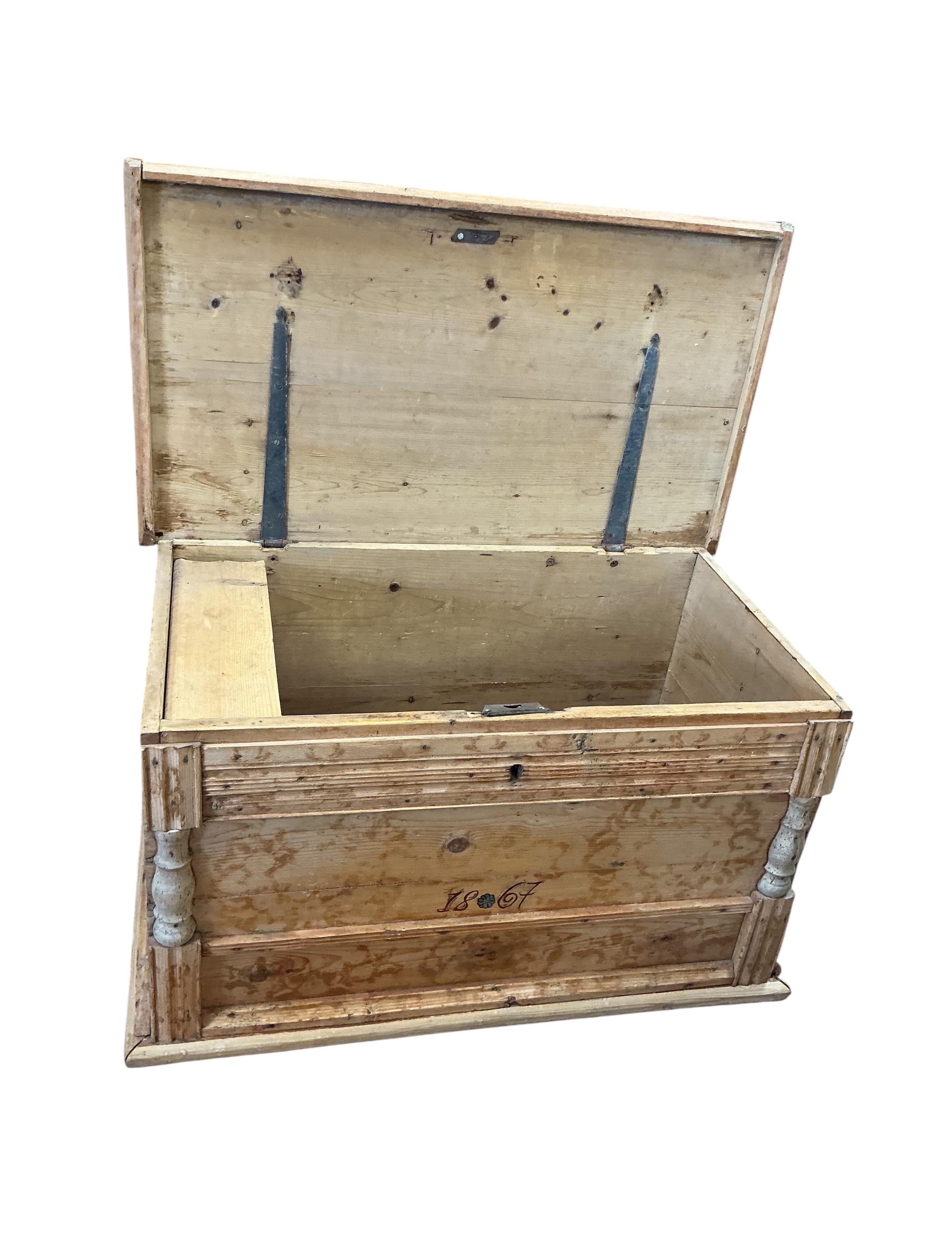 A 19th century Continental pine trunk, width 113cm, depth 64cm, height 65cm